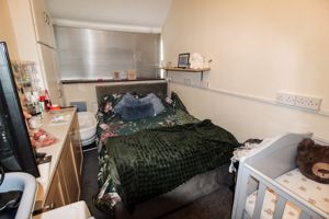 FAMILY ROOM/ CURRENTLY USED AS A BEDROOM- click for photo gallery